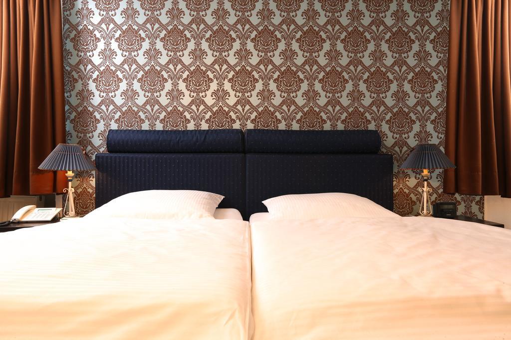 Hotel Amsterdam Hamburgo Quarto foto